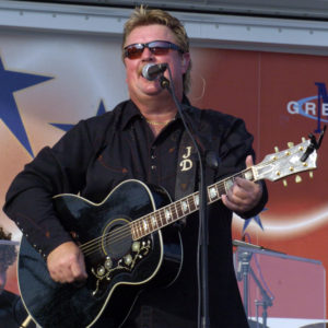 joe diffie black guitar singing live stage sunglasses